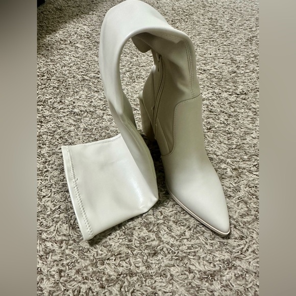Never been worn Steve Madden knee high cream color boots. - Picture 3 of 6